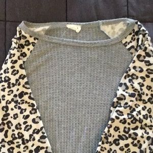 Women’s gray with animal print sleeves shirt